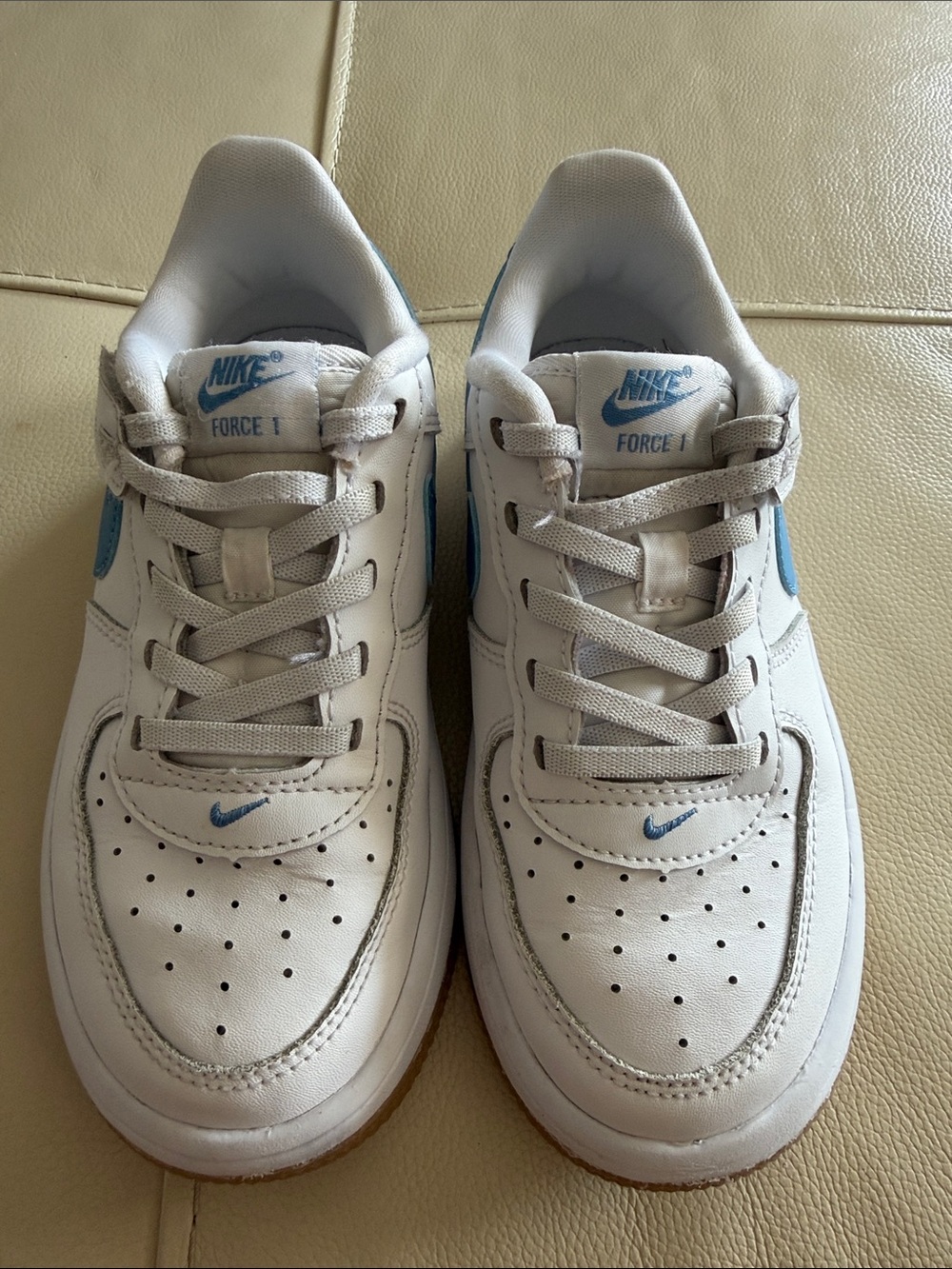 Nike Kids White Sneakers with Light Blue Accents